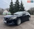 Черный Мазда 6, объемом двигателя 2.18 л и пробегом 240 тыс. км за 9500 $, фото 1 на Automoto.ua