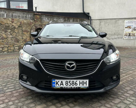Черный Мазда 6, объемом двигателя 2.2 л и пробегом 266 тыс. км за 10600 $, фото 1 на Automoto.ua