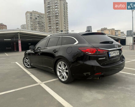 Черный Мазда 6, объемом двигателя 2.19 л и пробегом 261 тыс. км за 11000 $, фото 6 на Automoto.ua