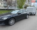 Черный Мазда 6, объемом двигателя 2.19 л и пробегом 234 тыс. км за 11000 $, фото 6 на Automoto.ua