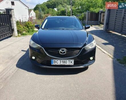 Черный Мазда 6, объемом двигателя 2.19 л и пробегом 291 тыс. км за 11800 $, фото 1 на Automoto.ua