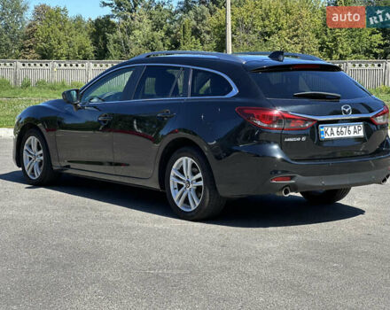 Чорний Мазда 6, об'ємом двигуна 2.19 л та пробігом 220 тис. км за 11900 $, фото 5 на Automoto.ua