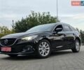 Черный Мазда 6, объемом двигателя 2.2 л и пробегом 257 тыс. км за 9850 $, фото 1 на Automoto.ua