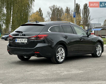 Черный Мазда 6, объемом двигателя 2.19 л и пробегом 220 тыс. км за 9300 $, фото 4 на Automoto.ua