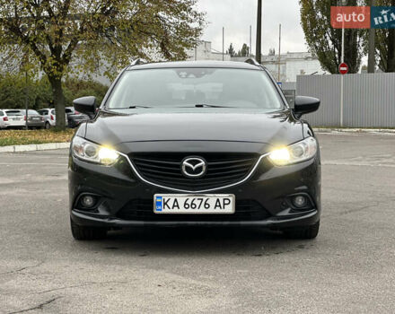 Черный Мазда 6, объемом двигателя 2.19 л и пробегом 220 тыс. км за 9300 $, фото 1 на Automoto.ua