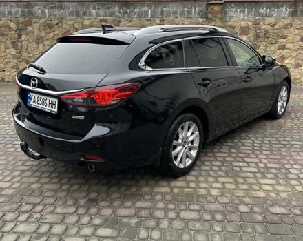 Черный Мазда 6, объемом двигателя 2.2 л и пробегом 266 тыс. км за 10600 $, фото 3 на Automoto.ua