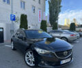 Черный Мазда 6, объемом двигателя 2.18 л и пробегом 256 тыс. км за 12200 $, фото 1 на Automoto.ua