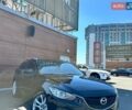 Черный Мазда 6, объемом двигателя 2.18 л и пробегом 269 тыс. км за 11700 $, фото 1 на Automoto.ua