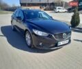 Черный Мазда 6, объемом двигателя 2.18 л и пробегом 241 тыс. км за 9500 $, фото 1 на Automoto.ua