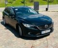 Черный Мазда 6, объемом двигателя 2.18 л и пробегом 280 тыс. км за 10500 $, фото 1 на Automoto.ua