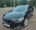 Черный Мазда 6, объемом двигателя 2.2 л и пробегом 265 тыс. км за 10900 $, фото 1 на Automoto.ua