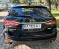 Черный Мазда 6, объемом двигателя 2.2 л и пробегом 245 тыс. км за 8598 $, фото 4 на Automoto.ua