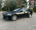 Черный Мазда 6, объемом двигателя 2.18 л и пробегом 239 тыс. км за 10000 $, фото 1 на Automoto.ua
