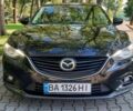 Черный Мазда 6, объемом двигателя 2.2 л и пробегом 245 тыс. км за 8598 $, фото 1 на Automoto.ua