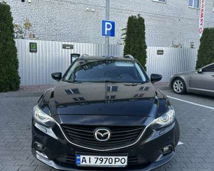 Черный Мазда 6, объемом двигателя 2.18 л и пробегом 256 тыс. км за 12200 $, фото 1 на Automoto.ua