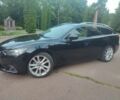 Черный Мазда 6, объемом двигателя 2.2 л и пробегом 265 тыс. км за 10900 $, фото 1 на Automoto.ua