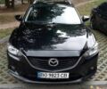 Черный Мазда 6, объемом двигателя 2.18 л и пробегом 260 тыс. км за 11000 $, фото 1 на Automoto.ua