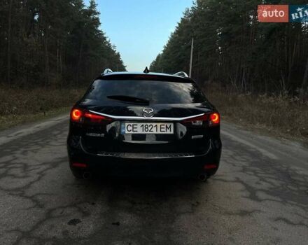Черный Мазда 6, объемом двигателя 2.18 л и пробегом 195 тыс. км за 9500 $, фото 6 на Automoto.ua