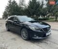 Черный Мазда 6, объемом двигателя 2.18 л и пробегом 175 тыс. км за 11000 $, фото 1 на Automoto.ua