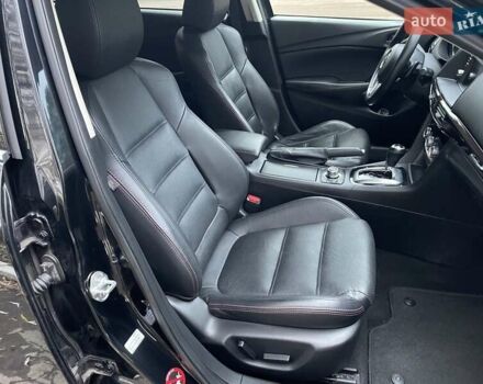 Черный Мазда 6, объемом двигателя 2.18 л и пробегом 175 тыс. км за 11000 $, фото 20 на Automoto.ua