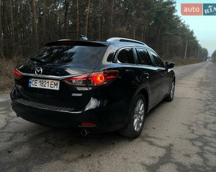 Черный Мазда 6, объемом двигателя 2.18 л и пробегом 195 тыс. км за 9500 $, фото 5 на Automoto.ua