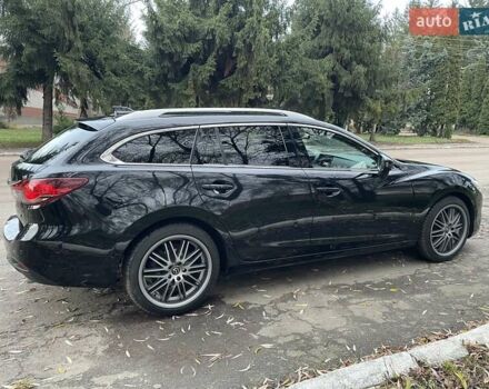 Черный Мазда 6, объемом двигателя 2.18 л и пробегом 175 тыс. км за 11000 $, фото 12 на Automoto.ua