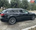 Черный Мазда 6, объемом двигателя 2.18 л и пробегом 175 тыс. км за 11000 $, фото 12 на Automoto.ua