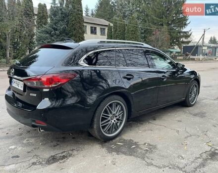 Черный Мазда 6, объемом двигателя 2.18 л и пробегом 175 тыс. км за 11000 $, фото 9 на Automoto.ua