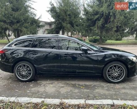 Черный Мазда 6, объемом двигателя 2.18 л и пробегом 175 тыс. км за 11000 $, фото 13 на Automoto.ua