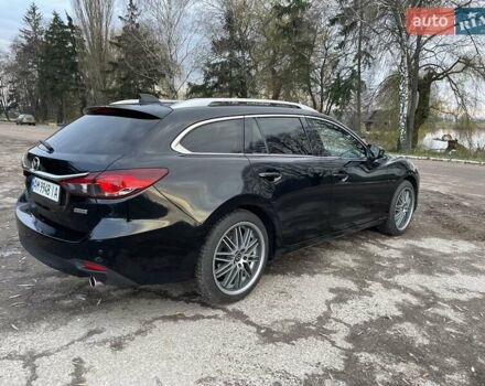 Черный Мазда 6, объемом двигателя 2.18 л и пробегом 175 тыс. км за 11000 $, фото 10 на Automoto.ua