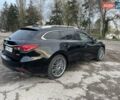 Черный Мазда 6, объемом двигателя 2.18 л и пробегом 175 тыс. км за 11000 $, фото 10 на Automoto.ua