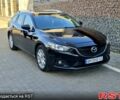 Черный Мазда 6, объемом двигателя 2.2 л и пробегом 262 тыс. км за 9800 $, фото 1 на Automoto.ua