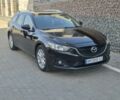 Черный Мазда 6, объемом двигателя 2.2 л и пробегом 262 тыс. км за 9800 $, фото 1 на Automoto.ua