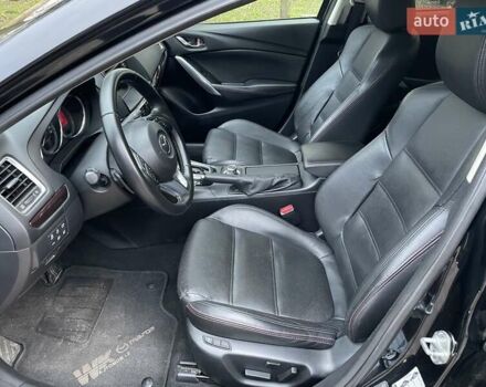 Черный Мазда 6, объемом двигателя 2.18 л и пробегом 175 тыс. км за 11000 $, фото 18 на Automoto.ua