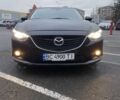 Черный Мазда 6, объемом двигателя 2.19 л и пробегом 300 тыс. км за 12200 $, фото 1 на Automoto.ua