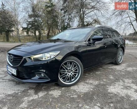 Черный Мазда 6, объемом двигателя 2.18 л и пробегом 175 тыс. км за 11000 $, фото 2 на Automoto.ua
