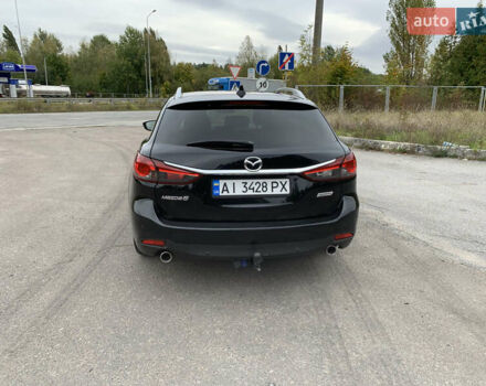 Чорний Мазда 6, об'ємом двигуна 2.19 л та пробігом 252 тис. км за 10999 $, фото 4 на Automoto.ua