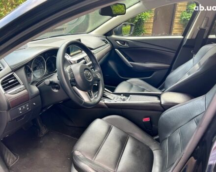 Черный Мазда 6, объемом двигателя 2.2 л и пробегом 248 тыс. км за 13790 $, фото 8 на Automoto.ua