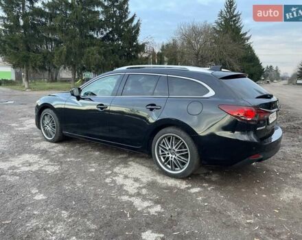 Черный Мазда 6, объемом двигателя 2.18 л и пробегом 175 тыс. км за 11000 $, фото 5 на Automoto.ua