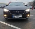 Черный Мазда 6, объемом двигателя 2.19 л и пробегом 300 тыс. км за 12200 $, фото 1 на Automoto.ua