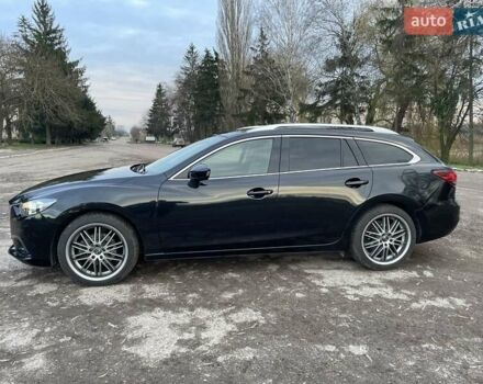 Черный Мазда 6, объемом двигателя 2.18 л и пробегом 175 тыс. км за 11000 $, фото 3 на Automoto.ua