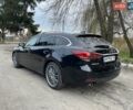 Черный Мазда 6, объемом двигателя 2.18 л и пробегом 175 тыс. км за 11000 $, фото 7 на Automoto.ua