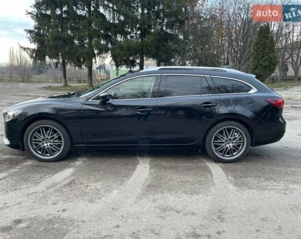 Черный Мазда 6, объемом двигателя 2.18 л и пробегом 175 тыс. км за 11000 $, фото 4 на Automoto.ua