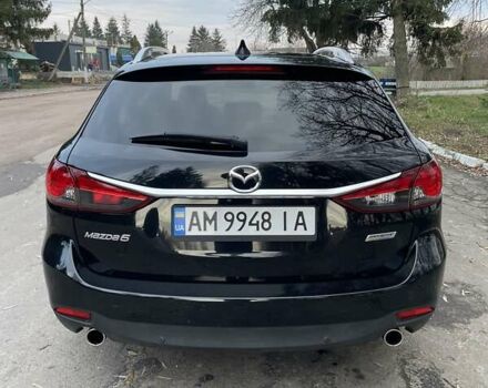 Черный Мазда 6, объемом двигателя 2.18 л и пробегом 175 тыс. км за 11000 $, фото 8 на Automoto.ua