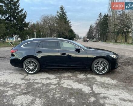 Черный Мазда 6, объемом двигателя 2.18 л и пробегом 175 тыс. км за 11000 $, фото 11 на Automoto.ua