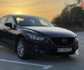Черный Мазда 6, объемом двигателя 2.19 л и пробегом 247 тыс. км за 12500 $, фото 1 на Automoto.ua
