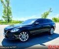 Черный Мазда 6, объемом двигателя 2.2 л и пробегом 67 тыс. км за 15500 $, фото 1 на Automoto.ua