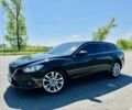 Черный Мазда 6, объемом двигателя 2.2 л и пробегом 67 тыс. км за 15500 $, фото 1 на Automoto.ua
