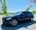 Черный Мазда 6, объемом двигателя 2.2 л и пробегом 67 тыс. км за 15500 $, фото 1 на Automoto.ua