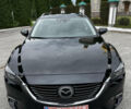 Черный Мазда 6, объемом двигателя 2.2 л и пробегом 173 тыс. км за 14600 $, фото 1 на Automoto.ua